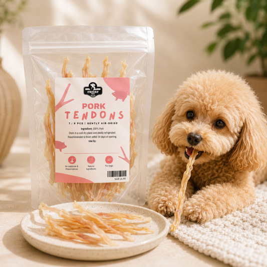 Dog eating pork tendons next to a package of pork tendons with a pink label.