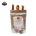 Sliced dehydrated natural pork ear dog chew treats in packaging