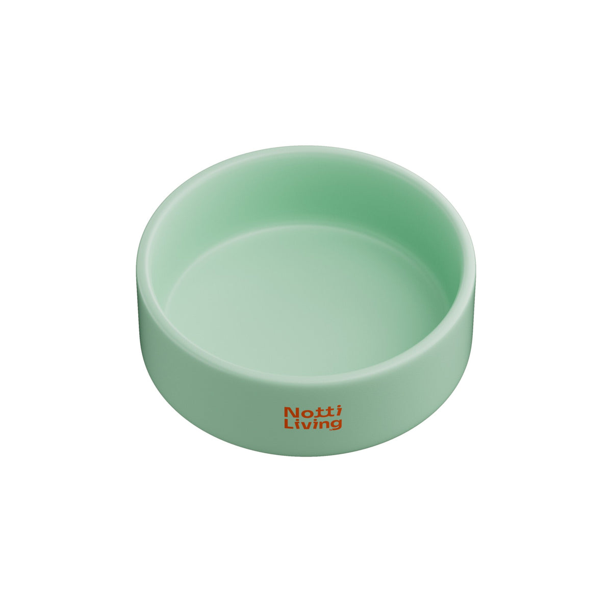 Notti Living 001 ceramic pet food bowl in Mint, a soft green bowl with orange Notti Living logo