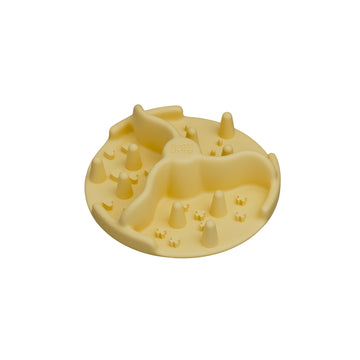 Notti Living slow feeding accessory in Yolk, a round yellow slow feeder with raised ridges and bumps that slow down mealtimes