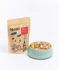 Notti 3-in-1 Protein Booster Freeze-Dried Cubes pack with cubes served in a bowl
